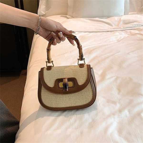 bag 10% off designer new grass woven women's casual bamboo handbag contrast saddle single shoulder oblique straddle bag
bag 10% off designer new grass woven women's casual bamboo handbag contrast saddle single shoulder oblique straddle bag