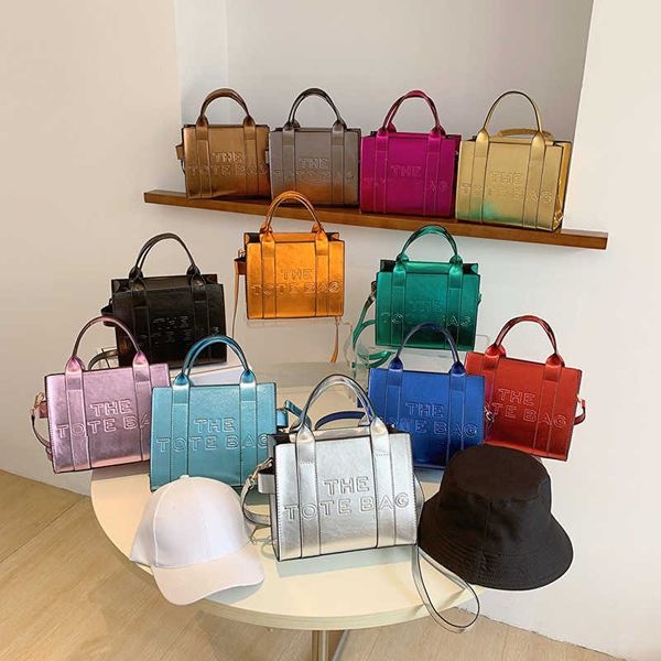tote bag large capacity crossbody bag thetotebag letter embossed handbag silver glossy lacquer leather shoulder bag
tote bag large capacity crossbody bag thetotebag letter embossed handbag silver glossy lacquer leather shoulder bag
