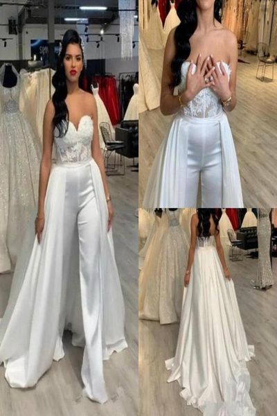 lace stain women wedding jumpsuit with removable skirt 2020 new strapless abiye bride wedding gowns with pant suit deane lita9965860, White
lace stain women wedding jumpsuit with removable skirt 2020 new strapless abiye bride wedding gowns with pant suit deane lita9965860, White