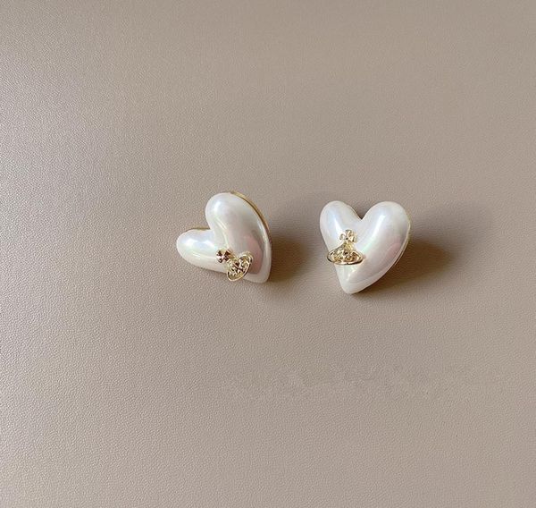 e022 small fashionable temperament heartshaped women039s pearl earrings6823133, Golden
e022 small fashionable temperament heartshaped women039s pearl earrings6823133, Golden