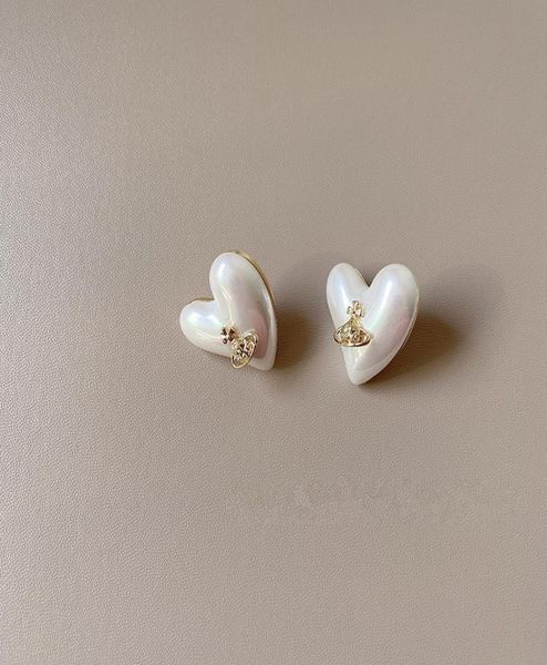 e022 small fashionable temperament heartshaped women039s pearl earrings9606840, Golden
e022 small fashionable temperament heartshaped women039s pearl earrings9606840, Golden