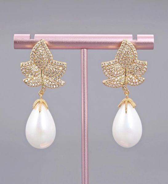 guaiguai jewelry white sea shell pearl gold color plated cz micro pave drop earrings for women real gems stone lady fashion jewell5988449, Silver
guaiguai jewelry white sea shell pearl gold color plated cz micro pave drop earrings for women real gems stone lady fashion jewell5988449, Silver