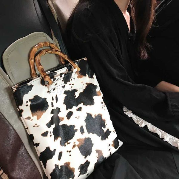 totes 2023 vintage cow pattern women handbags designer bamboo handle hand bags casual large capacity tote female purse lady bucket bagstylis
totes 2023 vintage cow pattern women handbags designer bamboo handle hand bags casual large capacity tote female purse lady bucket bagstylis