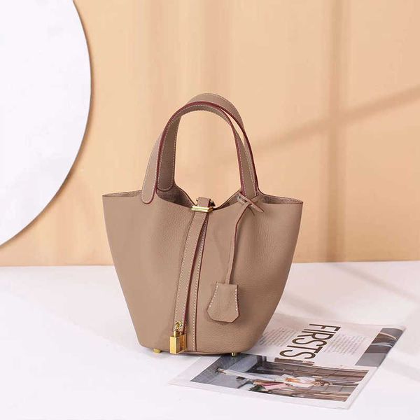 luxury picotin lock bag vegetable leather basket bag niche design 2023 new togo layer cowhide women's large capacity portable bucket 6d
luxury picotin lock bag vegetable leather basket bag niche design 2023 new togo layer cowhide women's large capacity portable bucket 6d