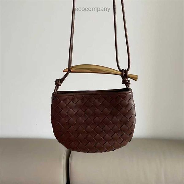 handbag spring designer woven 2023 sardine summer bag new cowhide niche design metal half moon tooth 5 05sb
handbag spring designer woven 2023 sardine summer bag new cowhide niche design metal half moon tooth 5 05sb