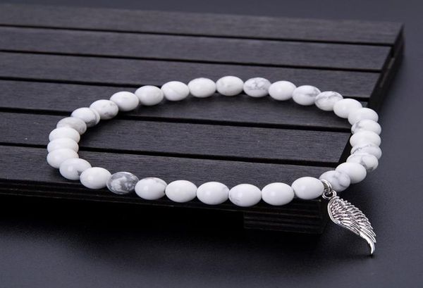 charm bracelets minimalist 8mm natural white turquoise bracelet stone angel wing pendant beads braclet men women jewelry pulseras 1447772, Golden;silver
charm bracelets minimalist 8mm natural white turquoise bracelet stone angel wing pendant beads braclet men women jewelry pulseras 1447772, Golden;silver