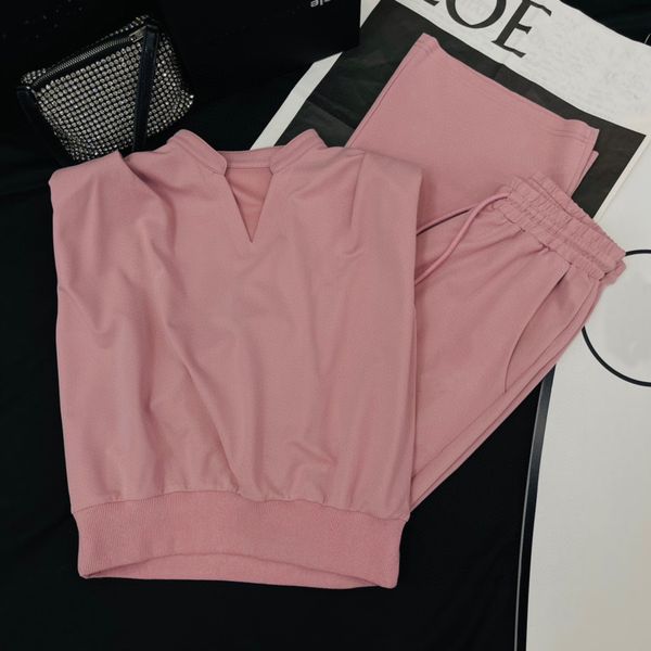 women sports suit black pink 2 colors v-neck vest and sports pants size sml with dust bag
women sports suit black pink 2 colors v-neck vest and sports pants size sml with dust bag