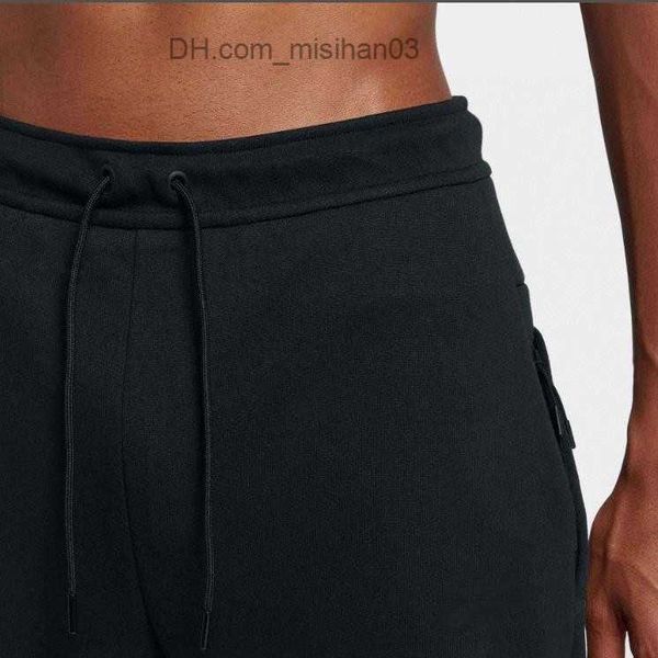 men's pants new tech mens pants designer jogging sport trousers fashion brand clothing side stripe drawstring bottoms z230721, Black
men's pants new tech mens pants designer jogging sport trousers fashion brand clothing side stripe drawstring bottoms z230721, Black