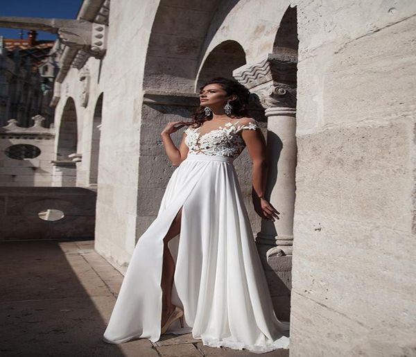 high side split chiffon long sweep spring wedding dresses sheer capped sleeves applique buttons see through back bridal gowns4048341, White
high side split chiffon long sweep spring wedding dresses sheer capped sleeves applique buttons see through back bridal gowns4048341, White