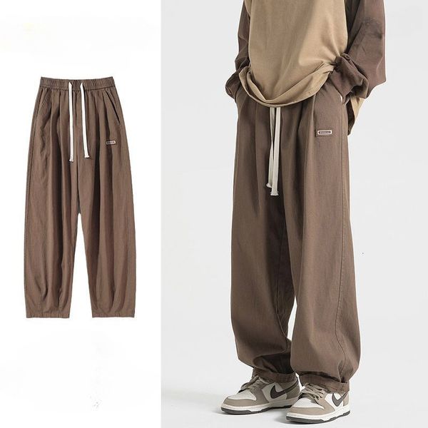 men's pants fashion waist drawcord stickers man sweatpants loose pocket straight cylinder casual boy sense of design male trousers 2023, Black
men's pants fashion waist drawcord stickers man sweatpants loose pocket straight cylinder casual boy sense of design male trousers 2023, Black