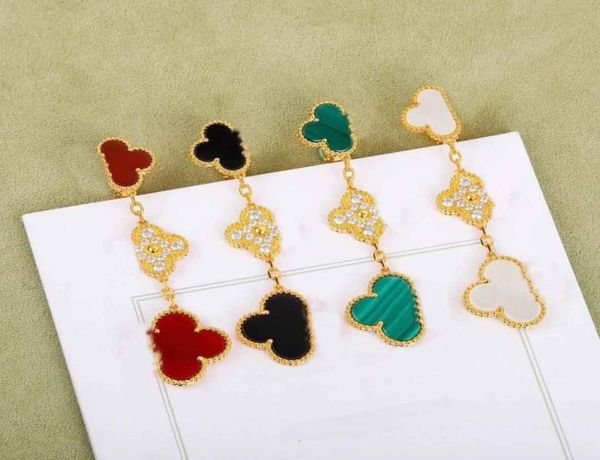 s925 silver luxurious quality three flower clip earring with white shell and purple grey shell malachite and diamonds for women we3182017
s925 silver luxurious quality three flower clip earring with white shell and purple grey shell malachite and diamonds for women we3182017