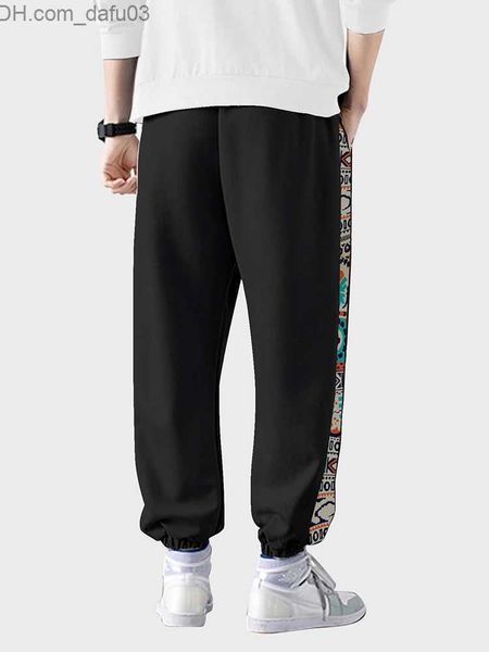 men's pants charmkpr 2023 fashion casual men's vintage geometric pattern pants fashion men's side print drawstring sweatpants, Black
men's pants charmkpr 2023 fashion casual men's vintage geometric pattern pants fashion men's side print drawstring sweatpants, Black