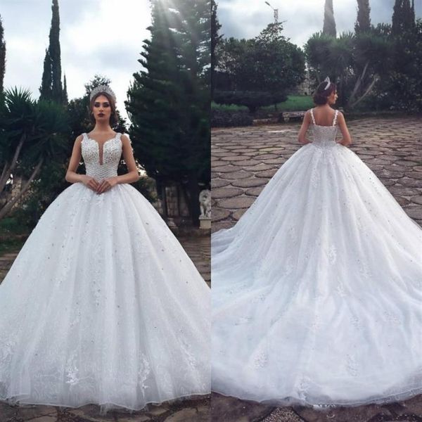 2022 luxurious crystal wedding dresses with beads ball gown sheer illusion spaghetti neck sleeveless long arabic bridal gowns bc272806, White
2022 luxurious crystal wedding dresses with beads ball gown sheer illusion spaghetti neck sleeveless long arabic bridal gowns bc272806, White
