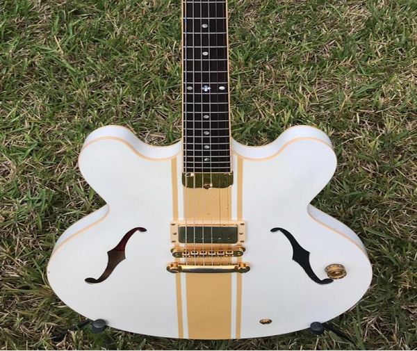 rare es 333 tom delonge signature semi hollow body white gold stripe jazz electric guitar black body binding single pickup gold 2038865
rare es 333 tom delonge signature semi hollow body white gold stripe jazz electric guitar black body binding single pickup gold 2038865