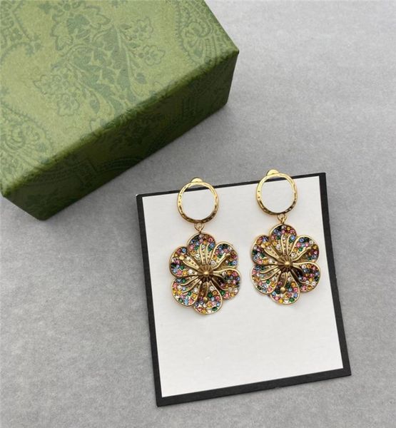stylish flower charm earrings colorful diamond pendant studs double letter designer eardrop with stamps for women party date gift4128037, Golden
stylish flower charm earrings colorful diamond pendant studs double letter designer eardrop with stamps for women party date gift4128037, Golden