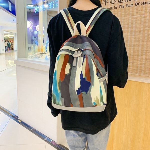 school bags cute college student backpacks graffiti camouflage backpack female schoolbag nylon travel rucksack for teenager girl bag mochila
school bags cute college student backpacks graffiti camouflage backpack female schoolbag nylon travel rucksack for teenager girl bag mochila