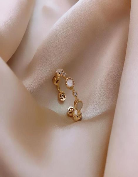 cluster rings korean fashion jewelry simple and exquisite copper inlaid zircon opal ring opening adjustable female daily1025997, Golden;silver
cluster rings korean fashion jewelry simple and exquisite copper inlaid zircon opal ring opening adjustable female daily1025997, Golden;silver