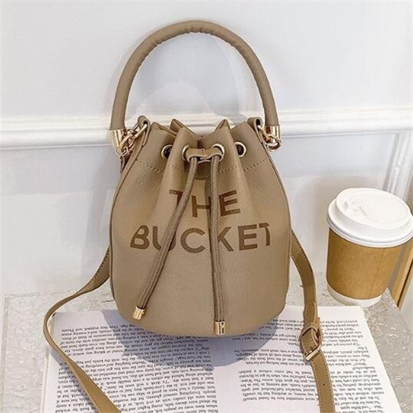 the tote bag designer letter drawstring bucket bag women evening bags pu leather all-match shopper shoulder bag handbags crossbody
the tote bag designer letter drawstring bucket bag women evening bags pu leather all-match shopper shoulder bag handbags crossbody