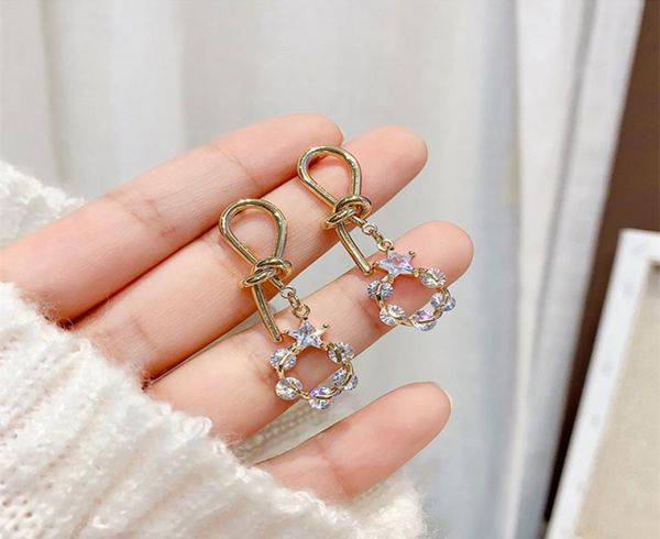 high sense female audience cool style retro earrings east gate silver needle knotting earrings korean earrings whole5161500, Golden
high sense female audience cool style retro earrings east gate silver needle knotting earrings korean earrings whole5161500, Golden