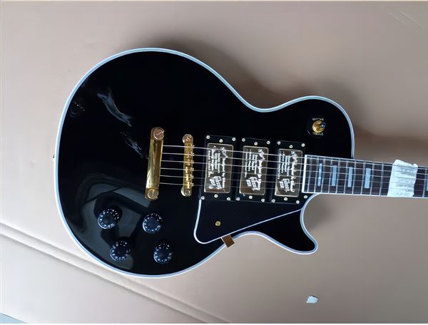custom lp electric guitar mahogany body ebony fingerboard gold hardware 3 pickup polished black
custom lp electric guitar mahogany body ebony fingerboard gold hardware 3 pickup polished black