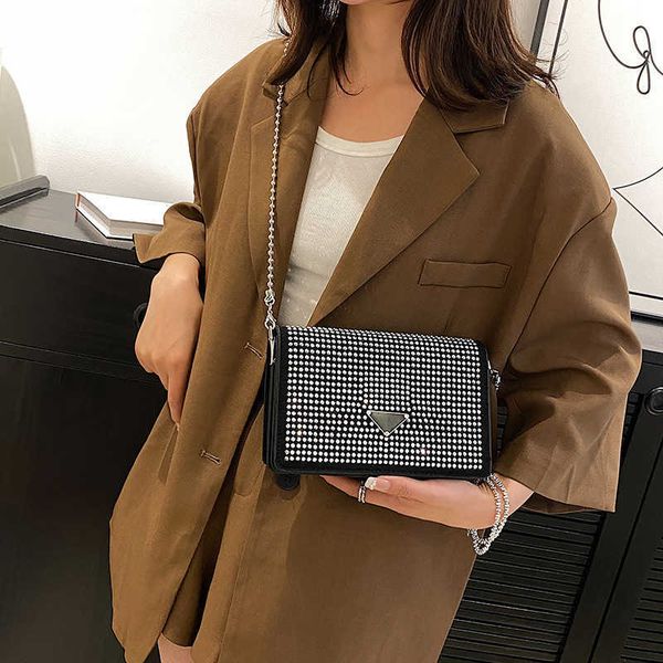 handbag designer 2023 water diamond women's small spring/summer new shoulder lipstick headphone mini crossbody bag
handbag designer 2023 water diamond women's small spring/summer new shoulder lipstick headphone mini crossbody bag