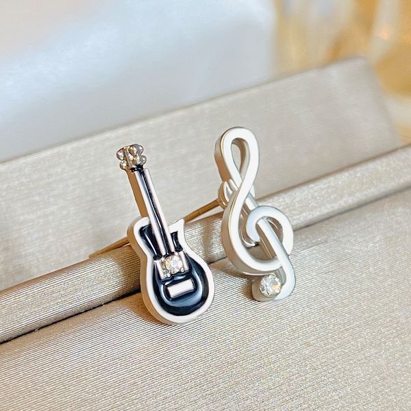 women guitar note stud earrings european asymmetrical violin diamond earrings women dress alloy silver ear nail jewelry accessories, Golden;silver
women guitar note stud earrings european asymmetrical violin diamond earrings women dress alloy silver ear nail jewelry accessories, Golden;silver
