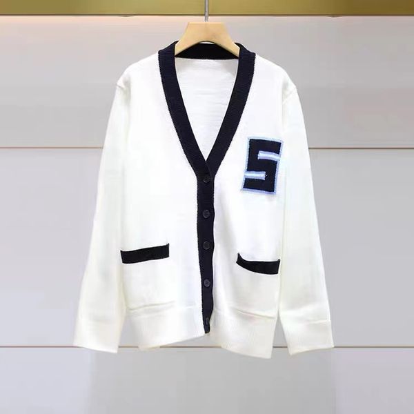sandro lettering embroidered contrast-trimmed v-neck knitted wool cardigan, Black;brown
sandro lettering embroidered contrast-trimmed v-neck knitted wool cardigan, Black;brown