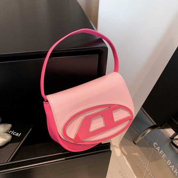handbag designer 2023 women's new leisure one shoulder oblique straddle handheld with small design underarm dingdang bag
handbag designer 2023 women's new leisure one shoulder oblique straddle handheld with small design underarm dingdang bag