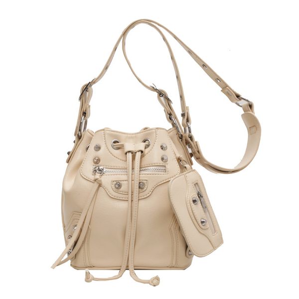 futuristic fashion statement: women's crossbody bag with motorcycle rivet style, drawstring bucket bag - a trendsetter's must-have
futuristic fashion statement: women's crossbody bag with motorcycle rivet style, drawstring bucket bag - a trendsetter's must-have
