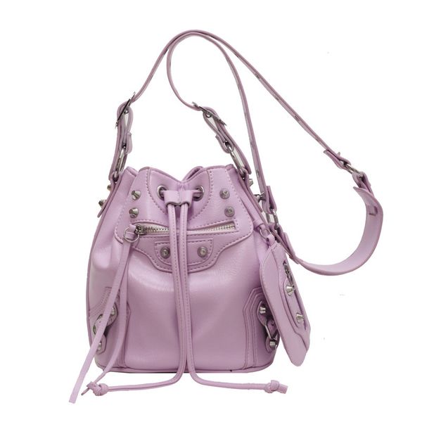 futuristic fashion statement: women's crossbody bag with motorcycle rivet style, drawstring bucket bag - a trendsetter's must-have
futuristic fashion statement: women's crossbody bag with motorcycle rivet style, drawstring bucket bag - a trendsetter's must-have