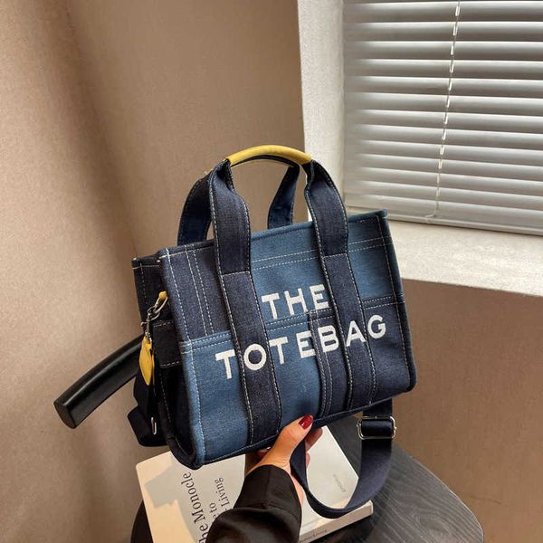 style large capacity canvas bag for women's version denim patchwork tote bag trend commuting shoulder bag
style large capacity canvas bag for women's version denim patchwork tote bag trend commuting shoulder bag