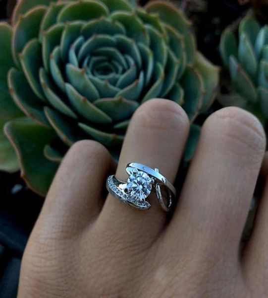 2019 fashion female big crystal round engagement ring cute silver zircon stone ring vintage wedding rings for women7111941, Golden;silver
2019 fashion female big crystal round engagement ring cute silver zircon stone ring vintage wedding rings for women7111941, Golden;silver