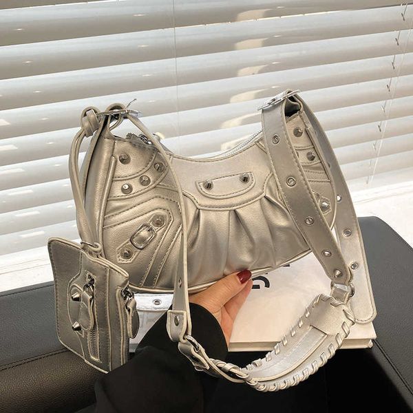 new underarm bag for women 2023 folded crescent mother one sling shoulder riveted locomotive purses
new underarm bag for women 2023 folded crescent mother one sling shoulder riveted locomotive purses