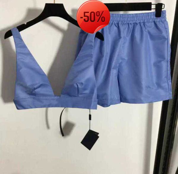 designer loose womens two piece pants set with triangle metal sleeveless v neck vest mini short sets streetwear fashion crop 23ss566953, White
designer loose womens two piece pants set with triangle metal sleeveless v neck vest mini short sets streetwear fashion crop 23ss566953, White