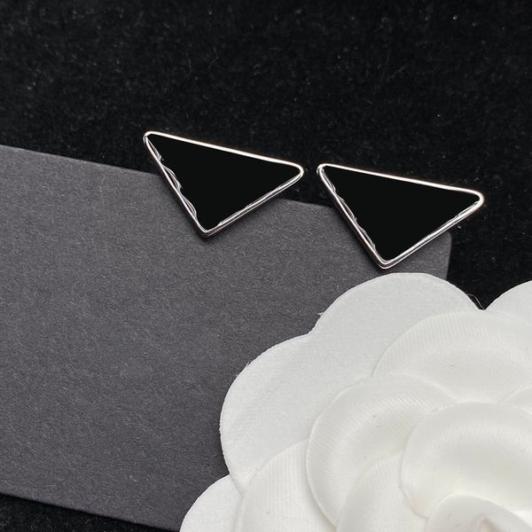 triangle badge earrings designer charm studs black night club personality studs creative letters female earring jewelry, Golden
triangle badge earrings designer charm studs black night club personality studs creative letters female earring jewelry, Golden