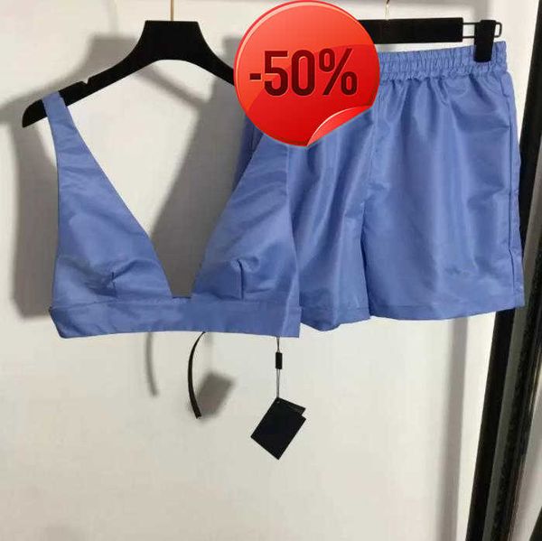 designer loose womens two piece pants set with triangle metal sleeveless v neck vest mini short sets streetwear fashion crop 23ss, White
designer loose womens two piece pants set with triangle metal sleeveless v neck vest mini short sets streetwear fashion crop 23ss, White