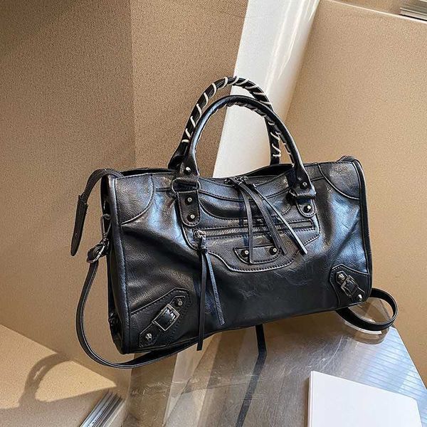 and large capacity handbag for women's 2023 new niche rivet tassel locomotive leather pattern one sling shoulder crossbody bag
and large capacity handbag for women's 2023 new niche rivet tassel locomotive leather pattern one sling shoulder crossbody bag