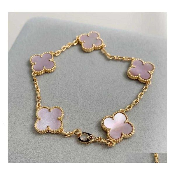 charm bracelets 2023 luxury clover designer bracelet mother of pearl 18k gol love bangle shining crystal diamond jewelry for drop del dhq8d4, Golden;silver
charm bracelets 2023 luxury clover designer bracelet mother of pearl 18k gol love bangle shining crystal diamond jewelry for drop del dhq8d4, Golden;silver
