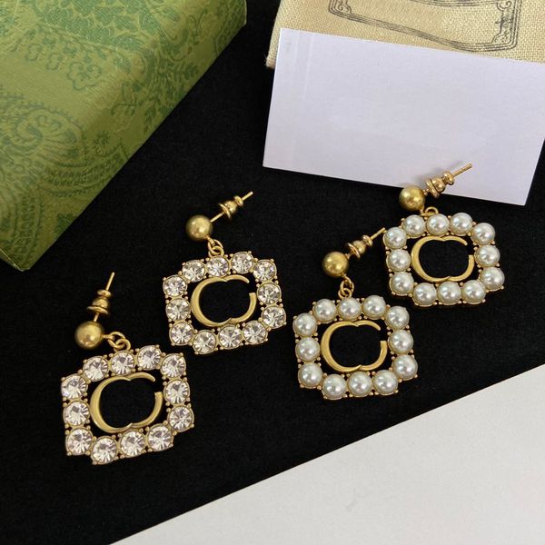 glittering diamond charm earrings double letters crystal studs designer rhinestone eardrops embossed stamp dangler, Golden
glittering diamond charm earrings double letters crystal studs designer rhinestone eardrops embossed stamp dangler, Golden