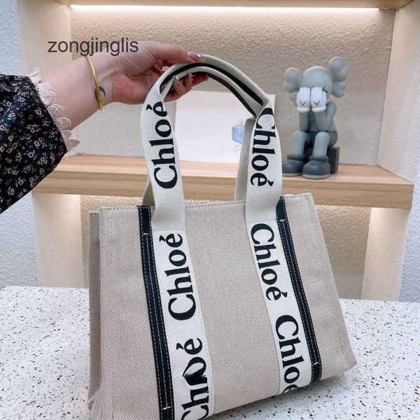 2023 designer tote bag woody bags outlet cloe handbag hands fashion beach one shoulder canvas niche design portable large tote women's
2023 designer tote bag woody bags outlet cloe handbag hands fashion beach one shoulder canvas niche design portable large tote women's