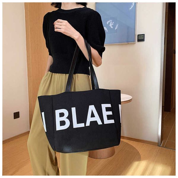 canvas tote bag women's version fashion letter one sling shoulder college student study personalized handheld shopping purses
canvas tote bag women's version fashion letter one sling shoulder college student study personalized handheld shopping purses