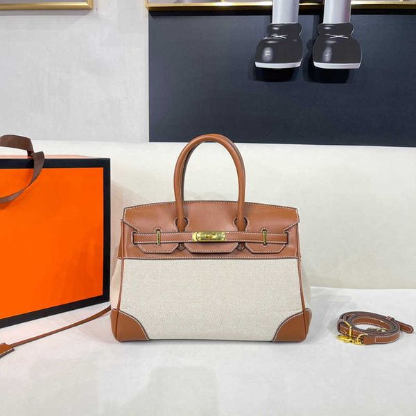 designer bag fashion brand handbag purse new canvas contrast panel swift tote bag 25cm handheld one shoulder crossbody wax thread kellyss wo
designer bag fashion brand handbag purse new canvas contrast panel swift tote bag 25cm handheld one shoulder crossbody wax thread kellyss wo