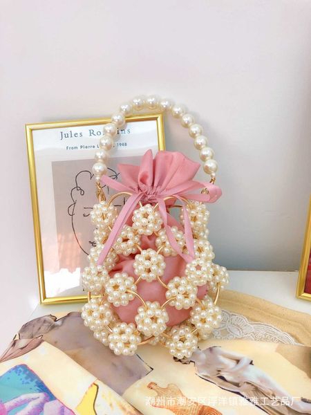 celebrity handwoven hollow beaded handheld bucket bag pearl bag handheld crossbody bag female 230725
celebrity handwoven hollow beaded handheld bucket bag pearl bag handheld crossbody bag female 230725