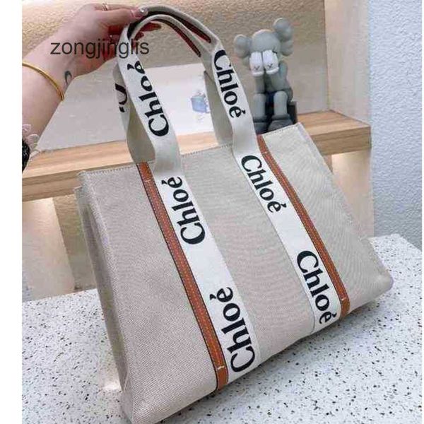 2023 bags tote woody handbag bag fashion one designer cloe shoulder canvas niche design portable large tote women's capacity thtr 
2023 bags tote woody handbag bag fashion one designer cloe shoulder canvas niche design portable large tote women's capacity thtr