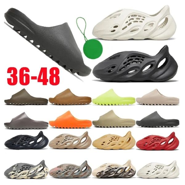 eur46 slippers for men women foam runners sandals onyx bone pure sand ararat us 13 36-48 pantoufle fashion designer sliders beach shoes flip, Black
eur46 slippers for men women foam runners sandals onyx bone pure sand ararat us 13 36-48 pantoufle fashion designer sliders beach shoes flip, Black
