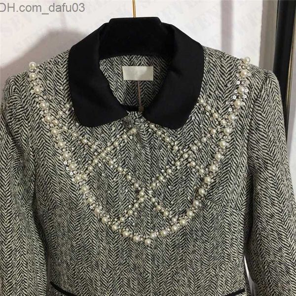 women's wool blends pearl woolen coats blends for women winter long sleeve wool dress coat high grade luxury ladies outerwear z230726, Black
women's wool blends pearl woolen coats blends for women winter long sleeve wool dress coat high grade luxury ladies outerwear z230726, Black