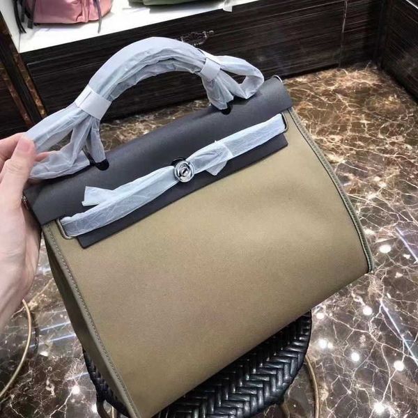 designer bag women's shoulder handbags cow leather/waterproof canvas handheld wallet leather new color contrast kellyss crossbody handb
designer bag women's shoulder handbags cow leather/waterproof canvas handheld wallet leather new color contrast kellyss crossbody handb