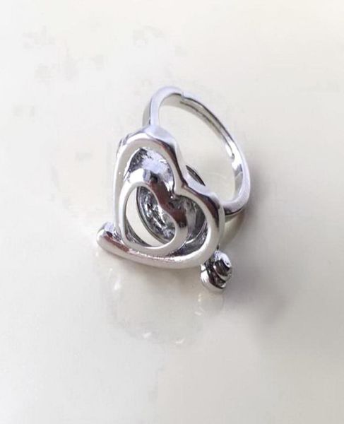 cage ring heart love shape ring can open hold pearl crystal gem bead adjustable size ring mounting2726648, Golden;silver
cage ring heart love shape ring can open hold pearl crystal gem bead adjustable size ring mounting2726648, Golden;silver