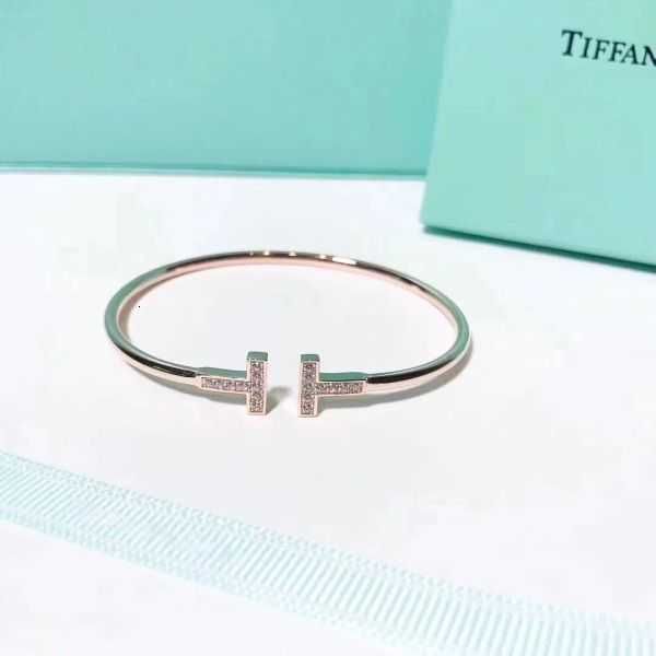 designer 18k gold bracelet double t shaped diamond highly polished c-shaped fashion white shell open coil ladies bracelet.r6oz, Black
designer 18k gold bracelet double t shaped diamond highly polished c-shaped fashion white shell open coil ladies bracelet.r6oz, Black