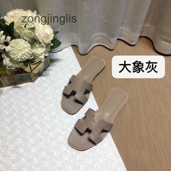 slipper h designer sandal shoes versatile women's slippers oran color summer bear matching leather one line for tourism wear flat botto
slipper h designer sandal shoes versatile women's slippers oran color summer bear matching leather one line for tourism wear flat botto